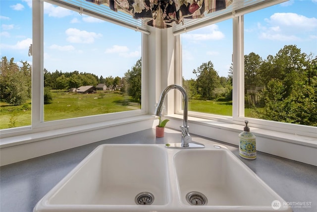 11207 16th St E, Edgewood, WA 98372 - kitchen view of a sink and a tree filled landscape