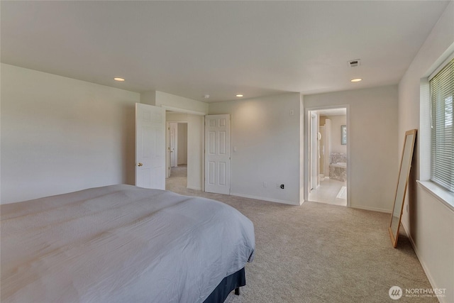 11207 16th St E, Edgewood, WA 98372 - bedroom with light carpet, recessed lighting, ensuite bath, and baseboards