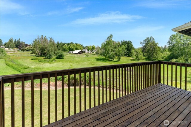 11207 16th St E, Edgewood, WA 98372 - deck with a yard and view of wooded area