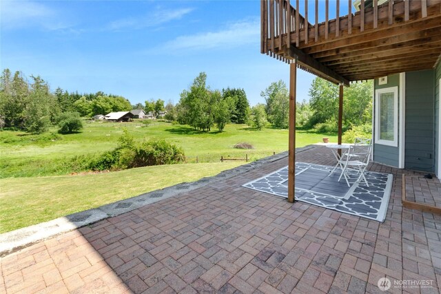 11207 16th St E, Edgewood, WA 98372 - view of patio / terrace featuring view of scattered trees