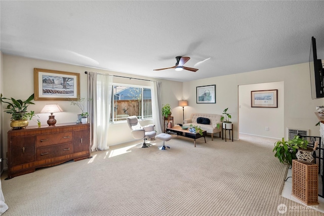 6901 Columbia Ct, Everett, WA 98203 - sitting room with a ceiling fan and light carpet