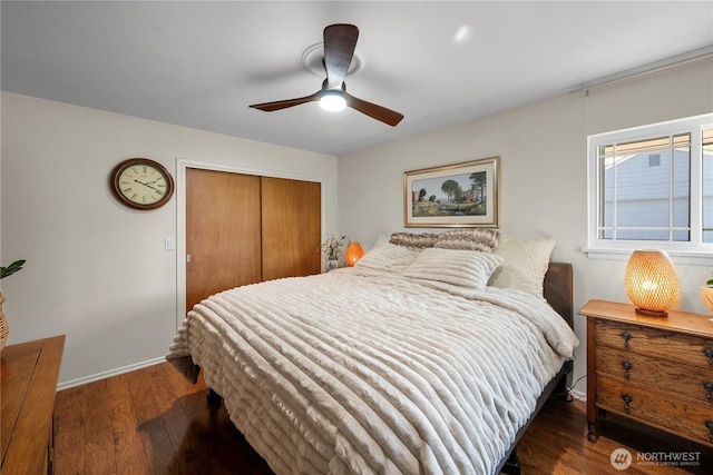 6901 Columbia Ct, Everett, WA 98203 - bedroom featuring a closet, wood finished floors, baseboards, and ceiling fan