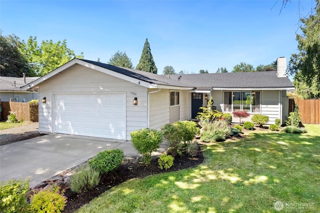 1980 Mckinley St, Enumclaw, WA 98022 - ranch-style home featuring a chimney, an attached garage, and driveway