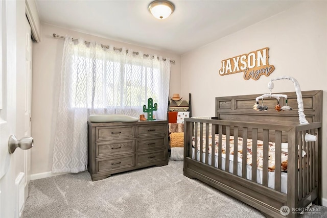 1980 Mckinley St, Enumclaw, WA 98022 - carpeted bedroom with baseboards and a crib