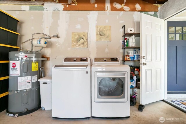 1980 Mckinley St, Enumclaw, WA 98022 - laundry area featuring strapped water heater and washer and dryer