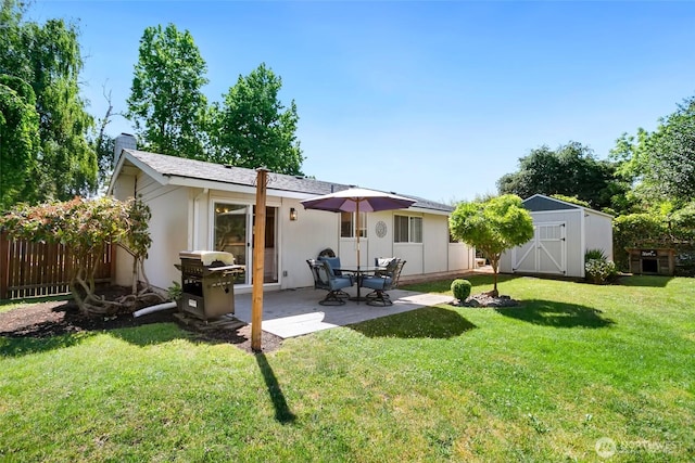 1980 Mckinley St, Enumclaw, WA 98022 - rear view of house with a storage unit, a patio, and a chimney
