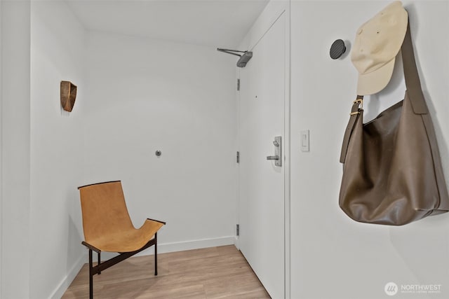 17 W Mercer St Unit 216, Seattle, WA 98119 - living area featuring light wood-style floors and baseboards