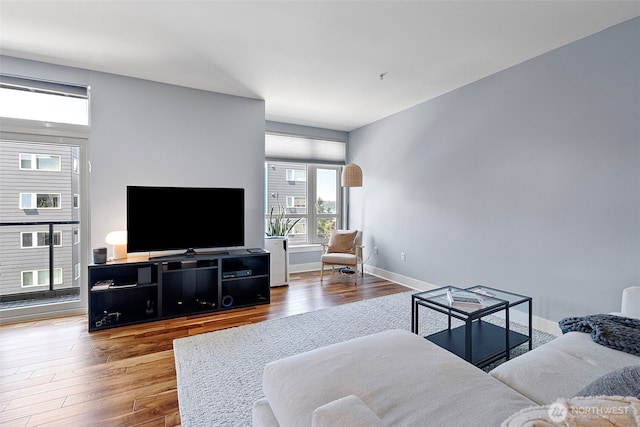 1501 Tacoma Ave S Unit 404, Tacoma, WA 98402 - living area with wood finished floors and baseboards