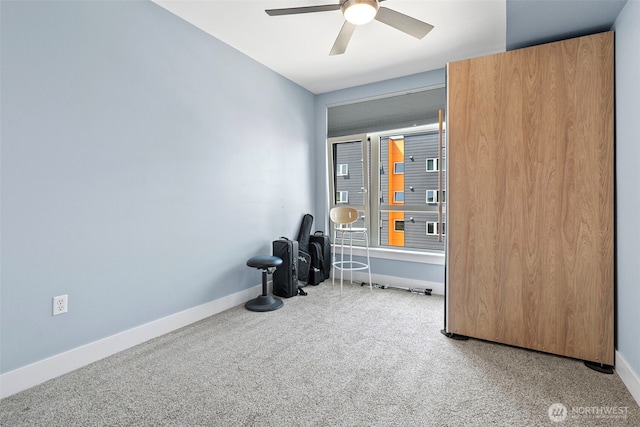 1501 Tacoma Ave S Unit 404, Tacoma, WA 98402 - bedroom featuring carpet flooring, baseboards, and a ceiling fan