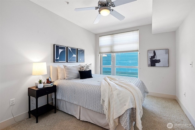 1501 Tacoma Ave S Unit 404, Tacoma, WA 98402 - carpeted bedroom featuring baseboards and a ceiling fan