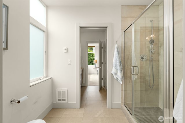 402 W Fulton St, Seattle, WA 98119 - full bathroom with a shower stall, tile patterned flooring, and heating unit