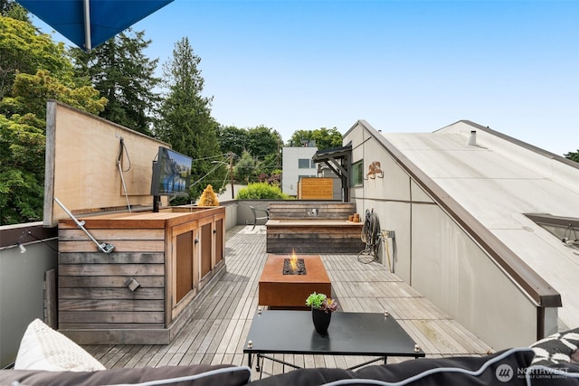 402 W Fulton St, Seattle, WA 98119 - wooden terrace with a fire pit