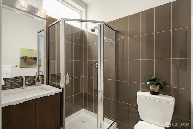 402 W Fulton St, Seattle, WA 98119 - full bath with tile walls, vanity, a stall shower, and tasteful backsplash