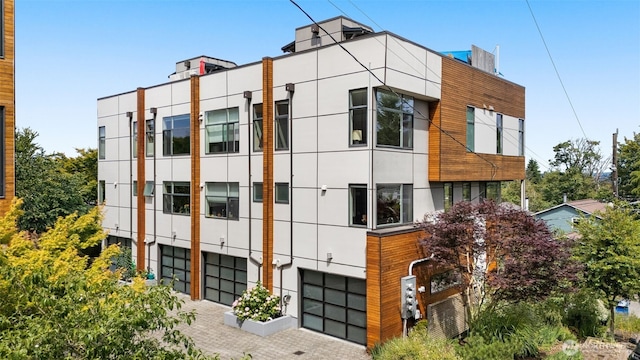 402 W Fulton St, Seattle, WA 98119 - view of building exterior featuring an attached garage