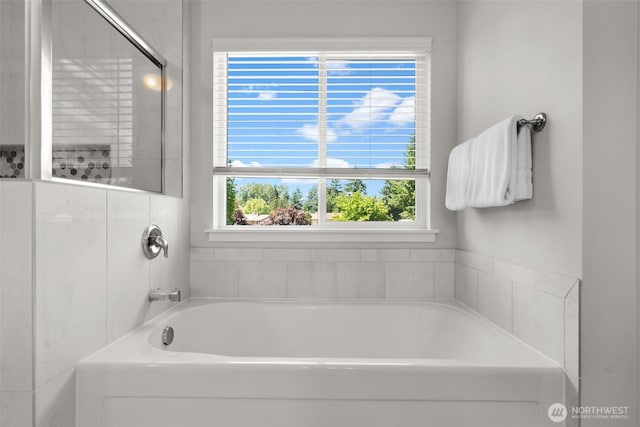 16152 8th Ave E, Spanaway, WA 98387 - bathroom featuring a tub to relax in and a shower