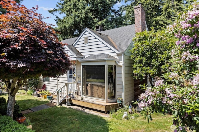 354 Farallone Ave, Fircrest, WA 98466 - view of front facade featuring roof with shingles, a front lawn, and a chimney