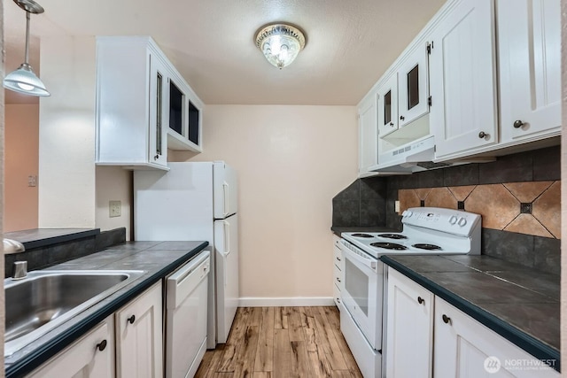 4601 SW 320th St Unit K4, Federal Way, WA 98023 - kitchen with white appliances, light wood finished floors, tasteful backsplash, a sink, and white cabinetry
