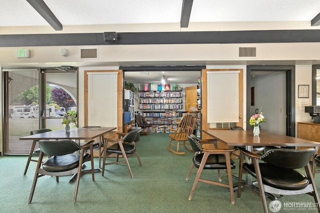 1402 22nd St NE Unit 515, Auburn, WA 98002 - carpeted dining space with beam ceiling
