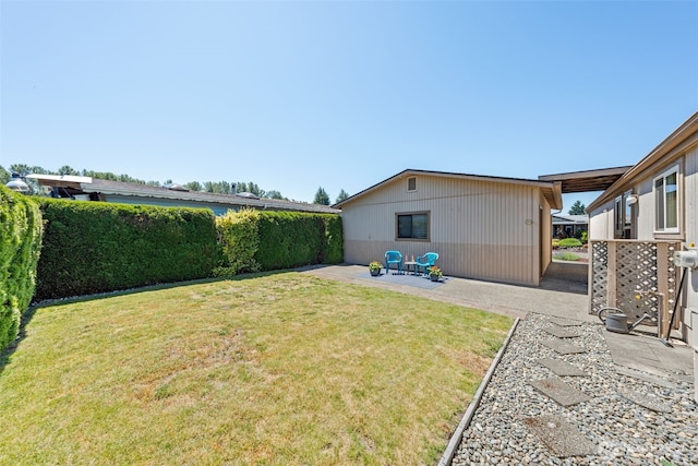 1402 22nd St NE Unit 515, Auburn, WA 98002 - view of grassy yard featuring a patio area