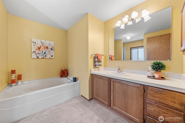 1402 22nd St NE Unit 515, Auburn, WA 98002 - full bath with vanity, a garden tub, and carpet floors