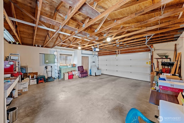 1402 22nd St NE Unit 515, Auburn, WA 98002 - garage with a garage door opener