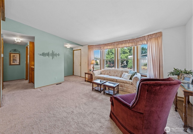 1402 22nd St NE Unit 515, Auburn, WA 98002 - living area with light carpet and vaulted ceiling
