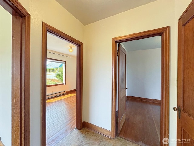 1025 W 6th St, Port Angeles, WA 98363 - hall featuring a baseboard radiator and baseboards