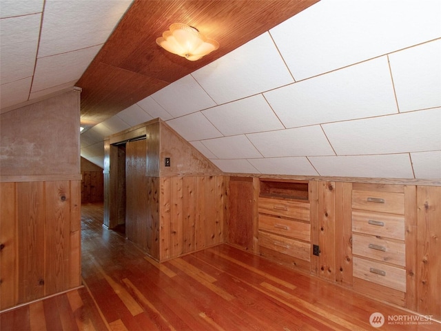1025 W 6th St, Port Angeles, WA 98363 - additional living space featuring wood walls, wood finished floors, and vaulted ceiling