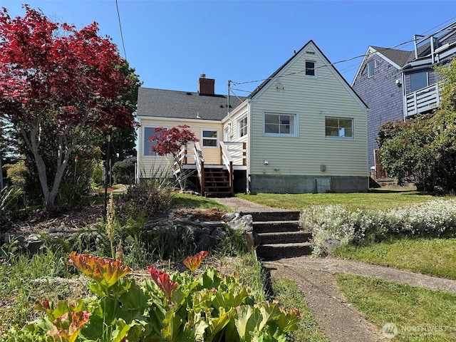 1025 W 6th St, Port Angeles, WA 98363 - rear view of property featuring a chimney