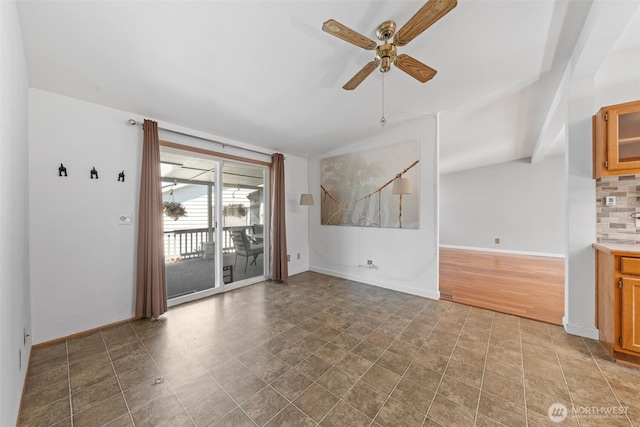 1402 22nd St NE Unit 438, Auburn, WA 98002 - unfurnished room with a ceiling fan and baseboards