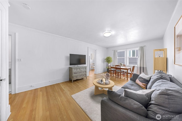 4725 15th Ave NE Unit 37, Seattle, WA 98105 - living room featuring light wood finished floors, baseboards, and crown molding