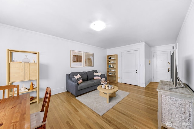 4725 15th Ave NE Unit 37, Seattle, WA 98105 - living area featuring light wood-type flooring, baseboards, and ornamental molding