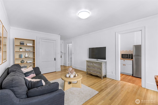 4725 15th Ave NE Unit 37, Seattle, WA 98105 - living area with crown molding and light wood-style flooring