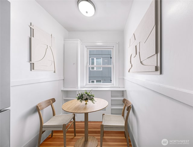 4725 15th Ave NE Unit 37, Seattle, WA 98105 - dining area with wood finished floors