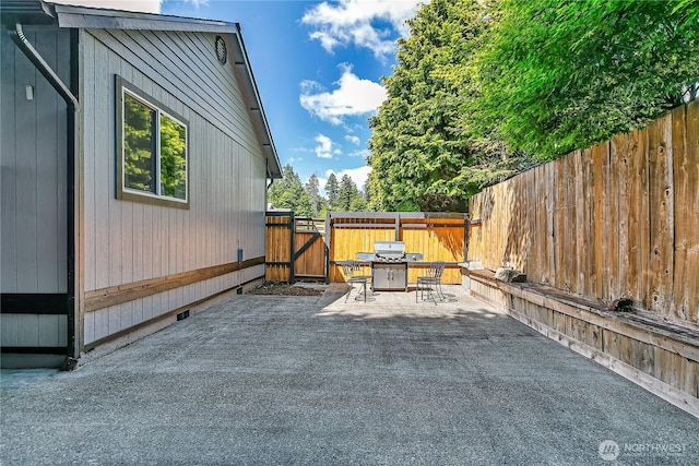 32116 Sunny Ln, Black Diamond, WA 98010 - view of patio / terrace featuring a gate and a grill