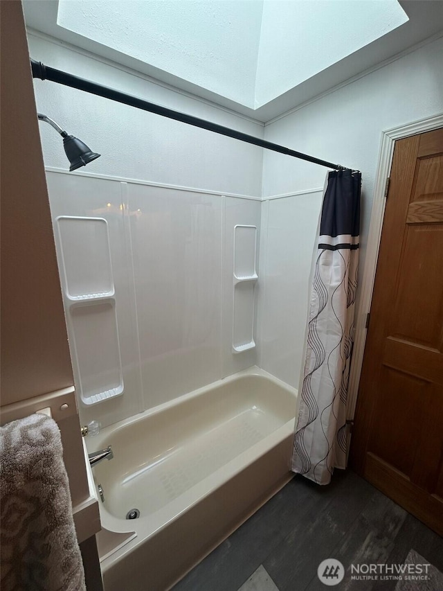 32116 Sunny Ln, Black Diamond, WA 98010 - bathroom with shower / tub combo with curtain and wood finished floors