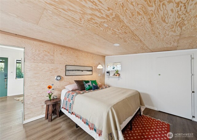 18482 Pull And Be Damned Rd, La Conner, WA 98257 - bedroom featuring wood finished floors, baseboards, and wooden ceiling
