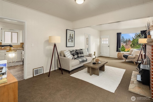 5011 5th Ave NE, Seattle, WA 98105 - carpeted living area with ornamental molding and baseboards