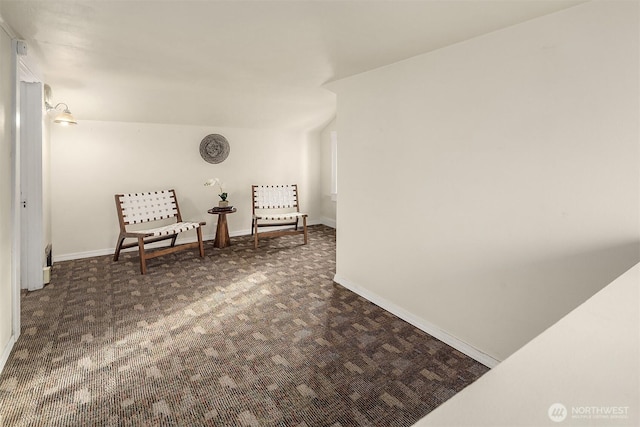 5011 5th Ave NE, Seattle, WA 98105 - sitting room featuring dark carpet and baseboards