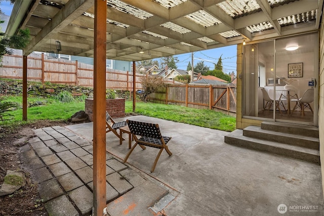 5011 5th Ave NE, Seattle, WA 98105 - fenced backyard with a patio, a pergola, and entry steps