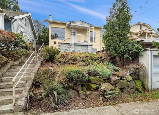5011 5th Ave NE, Seattle, WA 98105 - view of front of property with a chimney and stairs
