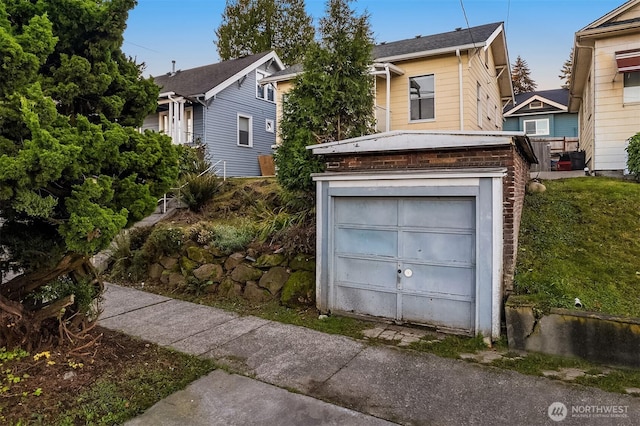 5011 5th Ave NE, Seattle, WA 98105 - view of front of house with a garage