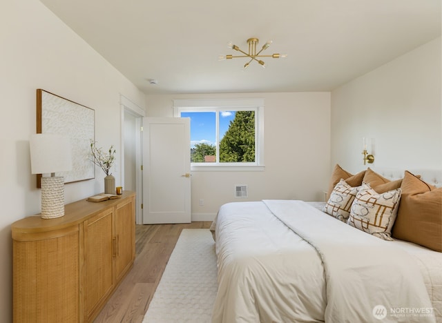 3304 37th Ave S, Seattle, WA 98144 - bedroom featuring light wood finished floors and baseboards