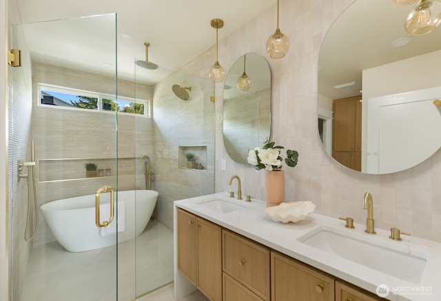 3304 37th Ave S, Seattle, WA 98144 - full bathroom featuring tile walls, double vanity, a freestanding tub, a shower with door, and tasteful backsplash