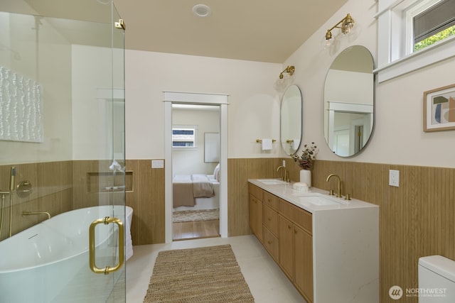 3304 37th Ave S, Seattle, WA 98144 - bathroom with a wainscoted wall, plenty of natural light, a freestanding tub, double vanity, and ensuite bathroom