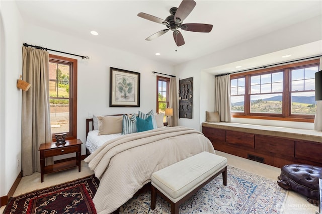 134 Borealis Ln, Manson, WA 98831 - bedroom with carpet floors, multiple windows, recessed lighting, and ceiling fan