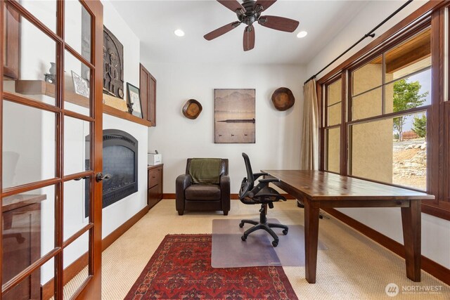 134 Borealis Ln, Manson, WA 98831 - office area with light colored carpet, baseboards, a fireplace, recessed lighting, and ceiling fan