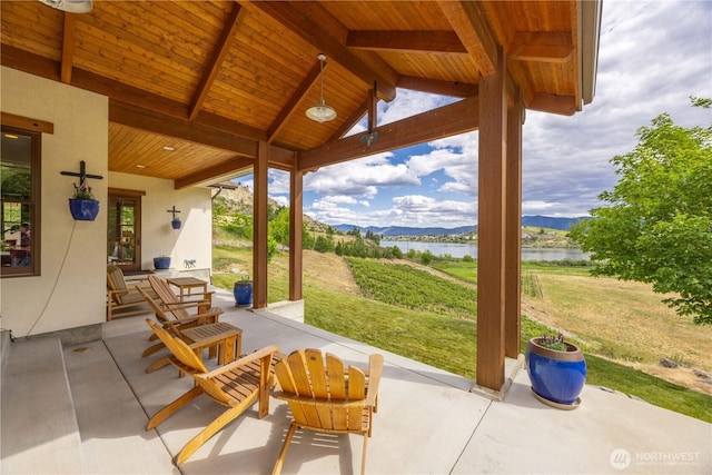 134 Borealis Ln, Manson, WA 98831 - view of patio featuring a water and mountain view