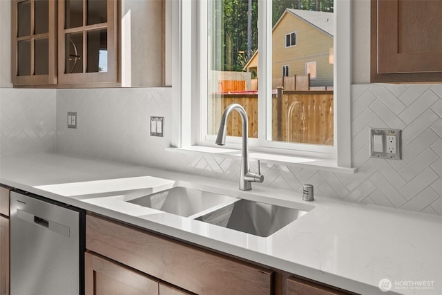 9645 7th Ave SE, Lacey, WA 98513 - kitchen with dishwasher, decorative backsplash, and glass insert cabinets