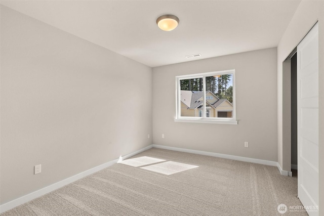9645 7th Ave SE, Lacey, WA 98513 - unfurnished bedroom with carpet and baseboards
